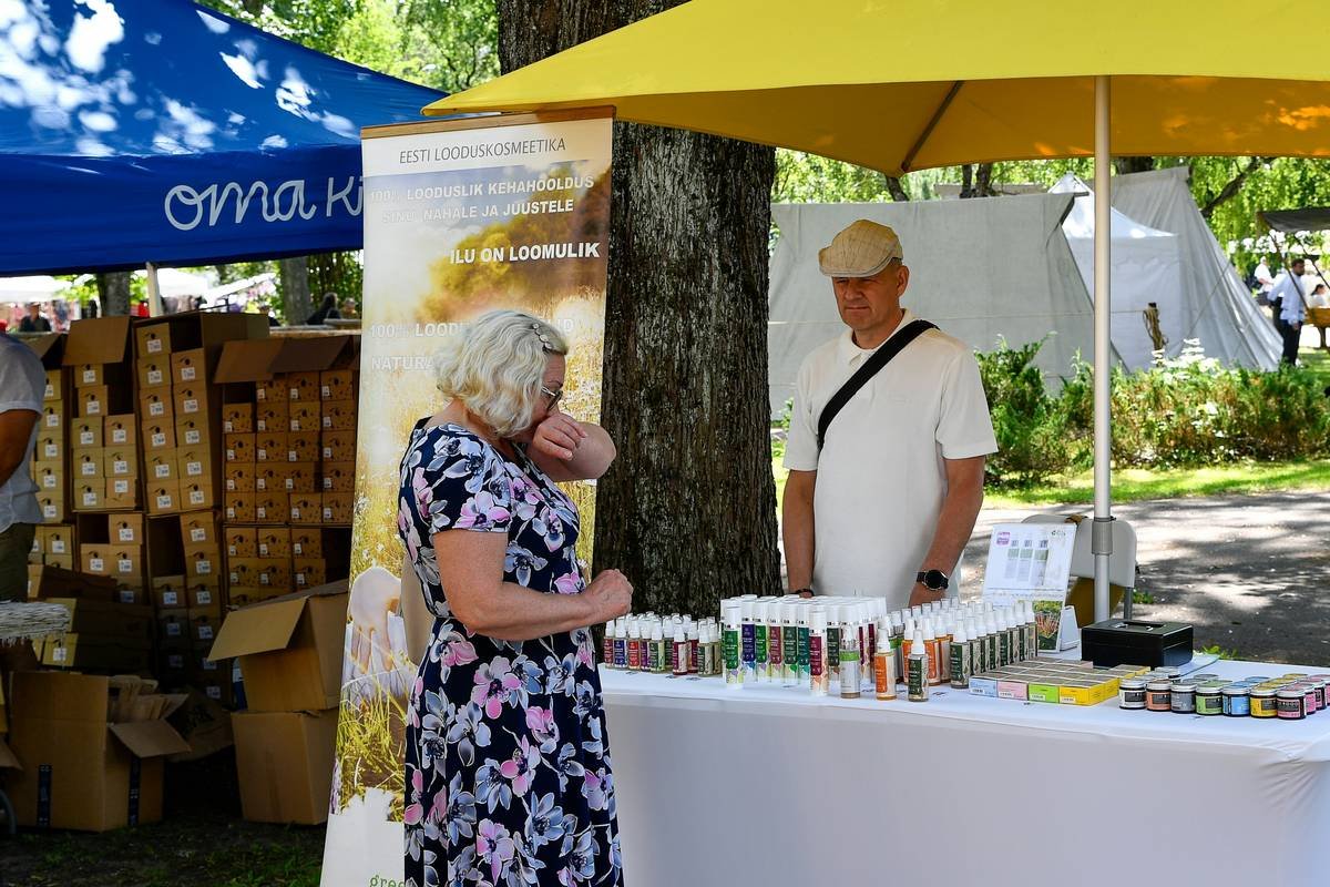 Australian woman reviewing clean beauty market australia product labels at home